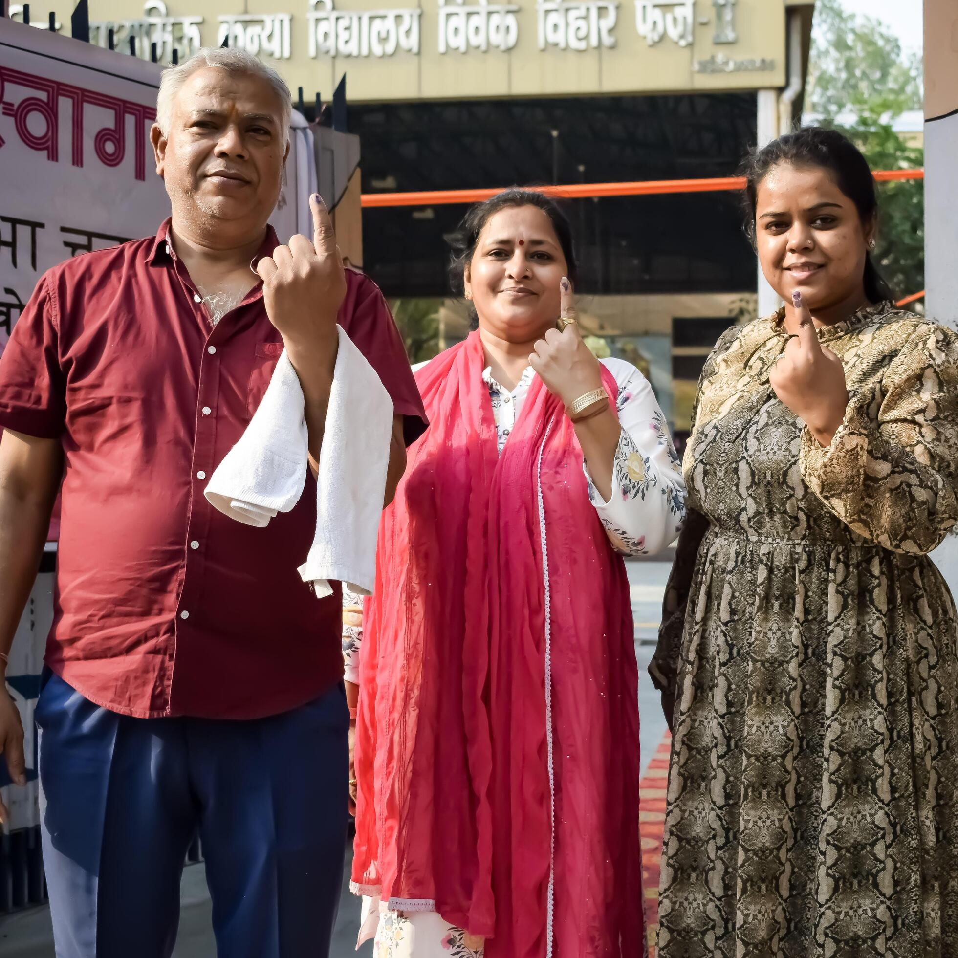 An inked finger after voting